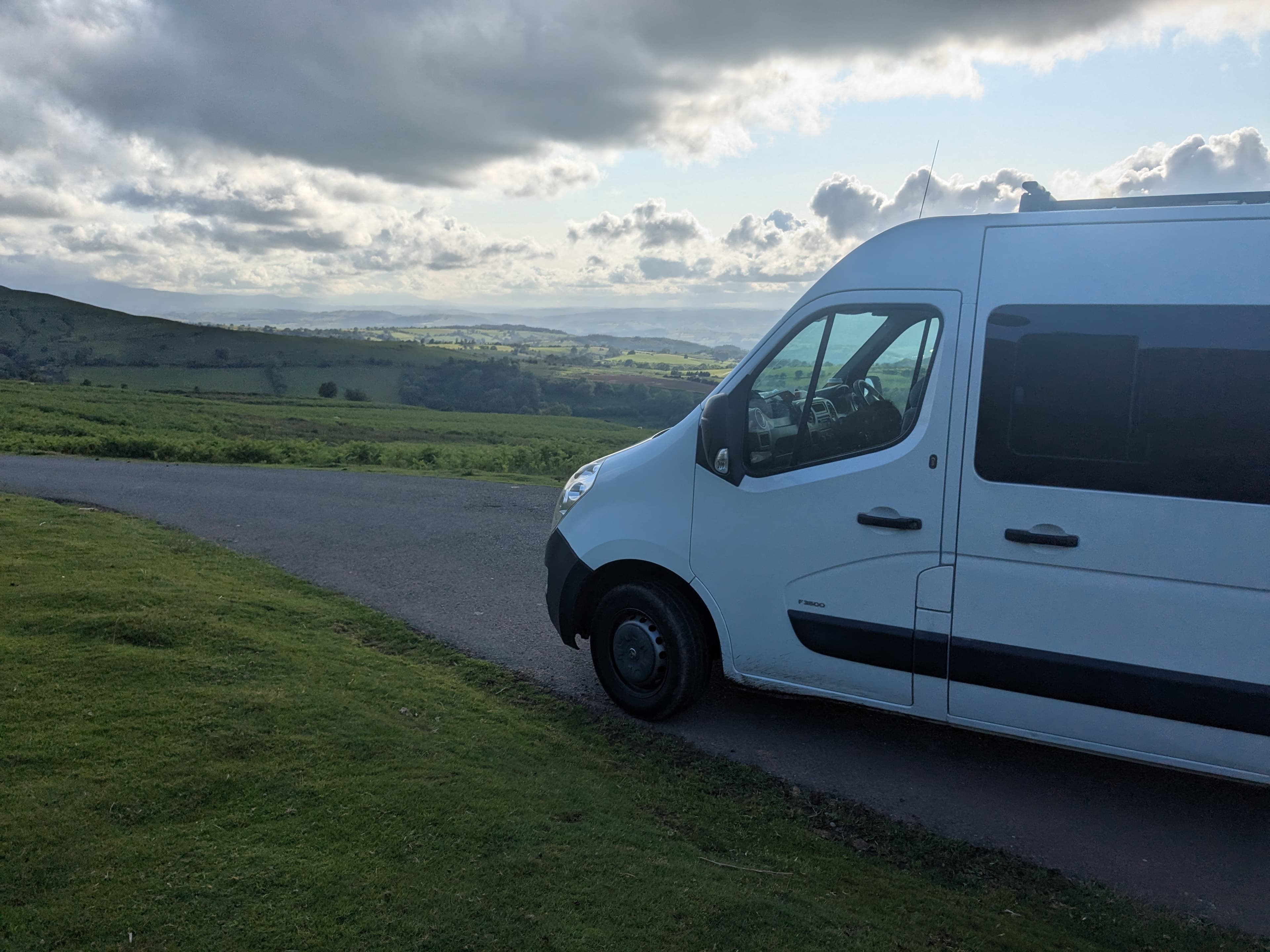 Floki the campervan parked between sits